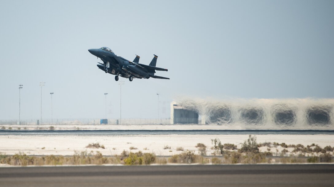 An F-15E Strike Eagle, assigned to the 336th Expeditionary Fighter Squadron, takes off for Agile Strike Sept. 18, 2019, at Al Dhafra Air Base, United Arab Emirates. The 336th EFS sent two aircraft and personnel to operate missions out of Prince Sultan Air Base, Saudi Arabia to challenge their flexibility at expanding tactical and strategic reach while strengthening coalition and regional partnerships in the Air Forces Central Command area of responsibility through adaptive basing. (U.S. Air Force photo by Staff Sgt. Chris Thornbury)