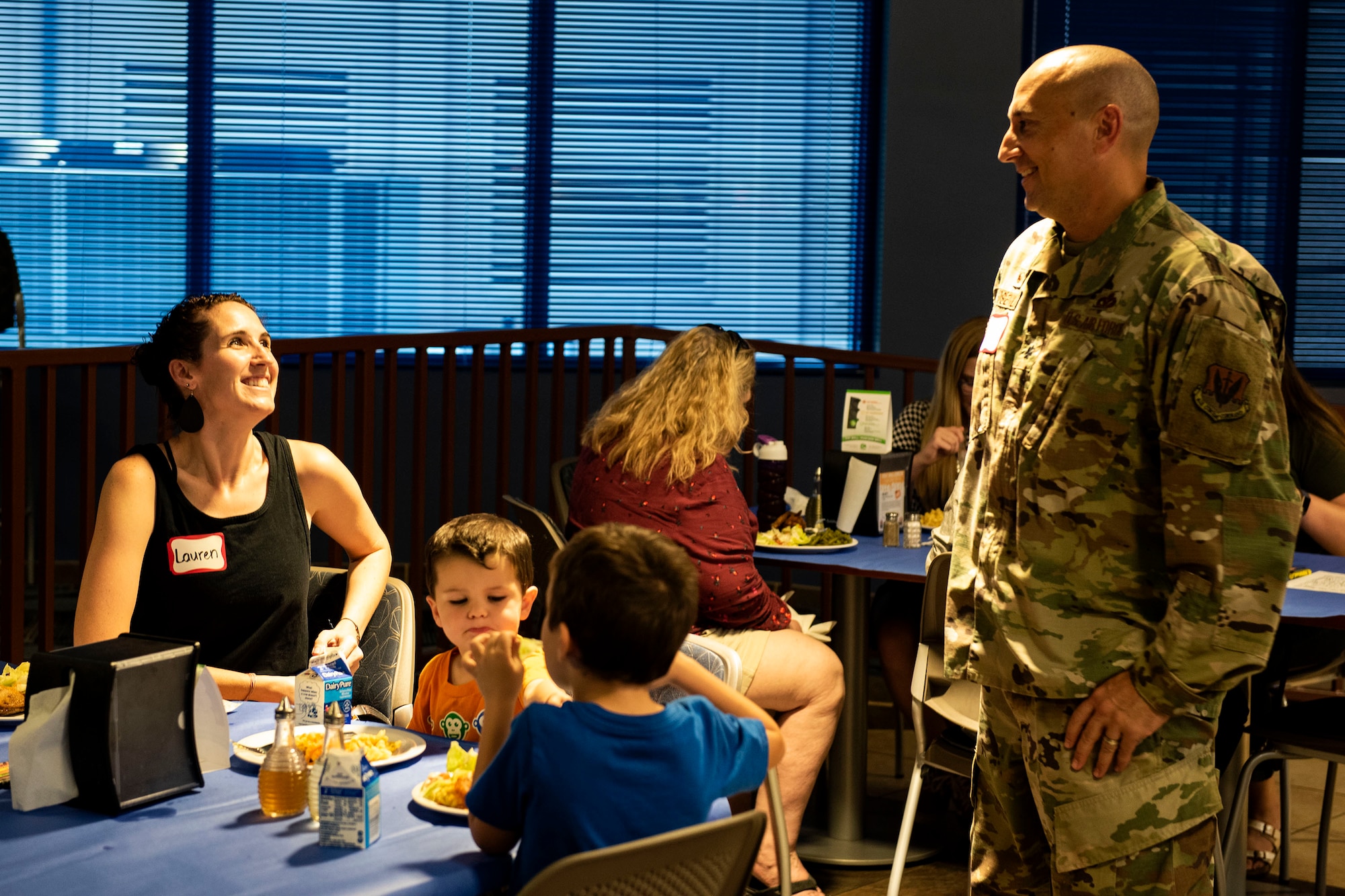 Lt. Col. Eric Rosenlof, right, 23d Civil Engineer Squadron commander, and Lauren Barthle, chat during a Deployed Spouses Dinner Sept. 17, 2019, at Moody Air Force Base, Ga. The monthly event is a free dinner at Georgia Pines Dining Facility designed as a ‘thank you’ for each families’ support and sacrifice. The dinner, occurring on every third Tuesday of the month, provides an opportunity for spouses to interact with other families of deployed Airmen, key spouses and unit leadership, as well as provide a break for the spouse while military sponsor is deployed. The next Deployed Spouses Dinner will be Oct. 15. (U.S. Air Force photo by Senior Airman Erick Requadt)