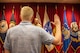 Pvt. 1st Class Michael Winter recites the Oath of Enlistment at the MEPS, in Beckley, West Virginia.