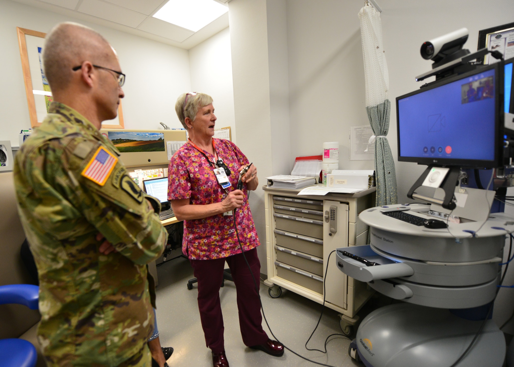 Lt. Gen. Ronald J. Place, the new Director of the Defense Health Agency, learns about the Stuttgart Army Health Clinic's Virtual Health Capabilities during his visit to Stuttgart on Sept. 11. Place was the Keynote Speaker at the TRICARE Eurasia Africa Commanders and Stakeholders Meeting at Sembach Kaserne, Germany, Sept 9-13. During the visit, he also met with senior military leaders and Surgeons General from Unified Combatant Commands. (Courtesy photo)
