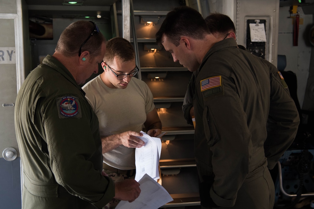 U.S. Air Force Airmen look over the inventory for the U.S. Air Force C-17 Globemaster III from the Mississippi Air National Guard’s 172nd Airlift Wing during a Joint Task Force Civil Support exercise at Joint Base Langley-Eustis, Virginia, Sept. 11, 2019. The cargo had to be transported from JBLE to Richmond, Virginia to help simulate the operations during real world situations. (U.S. Air Force photo by Airman 1st Class Marcus M. Bullock)