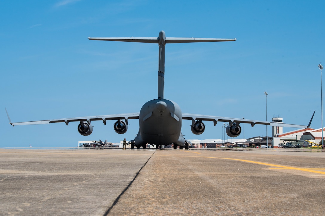 A U.S. Air Force C-17 Globemaster III from the Mississippi Air National Guard’s 172nd Airlift Wing, prepares for takeoff during a Joint Task Force Civil Support exercise at Joint Base Langley-Eustis, Virginia, Sept. 11, 2019. The C-17 transported vehicles from JBLE to Richmond, Virginia as part of a joint training exercise coordinated between the Air Force, Army, and Navy. (U.S. Air Force photo by Airman 1st Class Marcus M. Bullock)