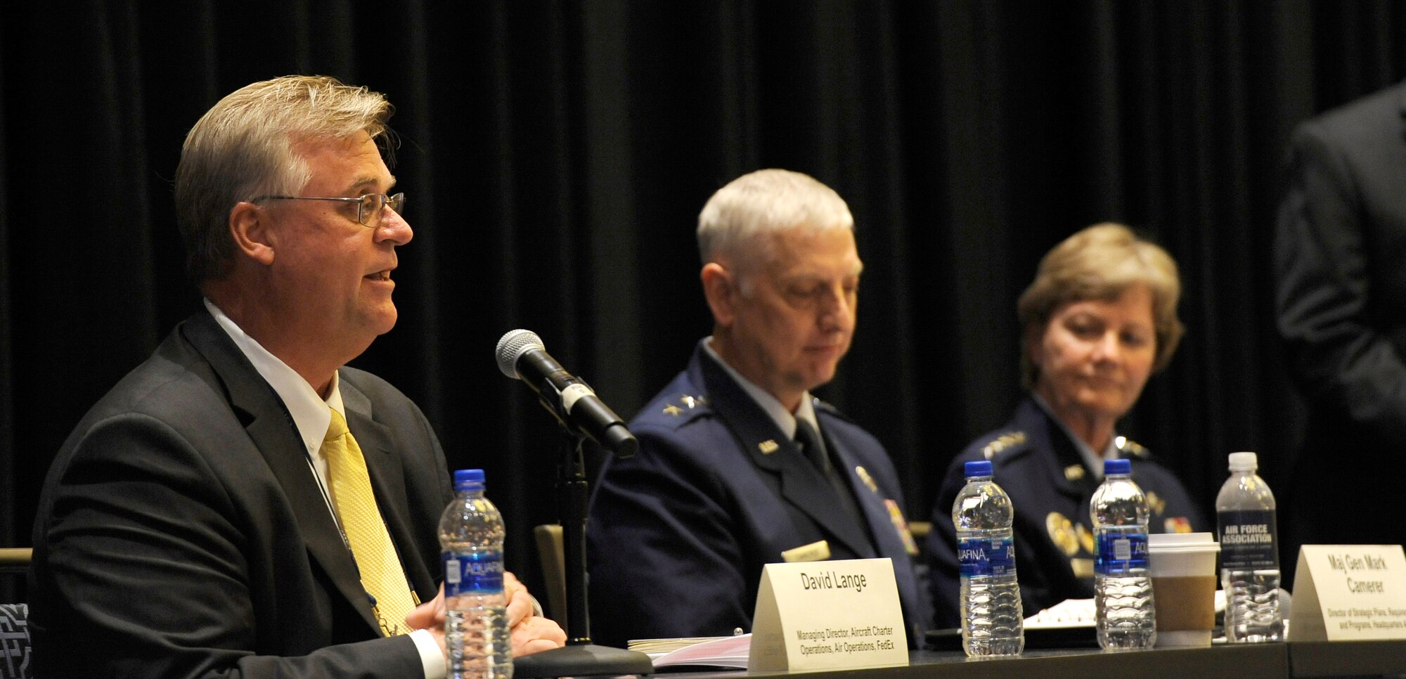 David Lange Jr., Federal Express managing director, Maj. Gen. Mark Camerer, Air Mobility Command strategic plans, requirements and programs director, and Gen. Maryanne Miller, Air Mobility Command commander, participate in the Expanding the Competitive Airlift Edge panel during the Air Force Association Air, Space and Cyber Conference in National Harbor, Md., Sept. 17, 2019. The ASC Conference is a professional development conference that offers the opportunity for Department of Defense personnel to participate in forums, speeches and workshops. (U.S. Air Force photo by Tech. Sgt. Robert Barnett)