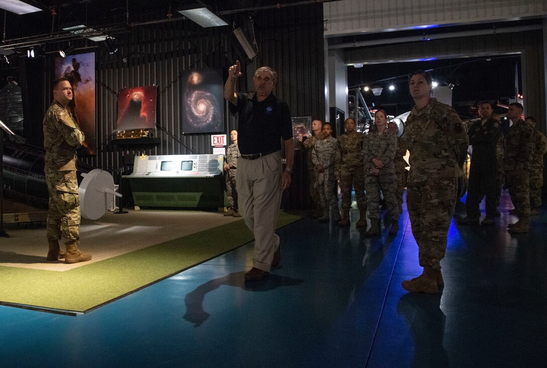 A tour guide at the Stafford Air and Space Museum shows off different parts of the museum after the IG Professional Development seminar,