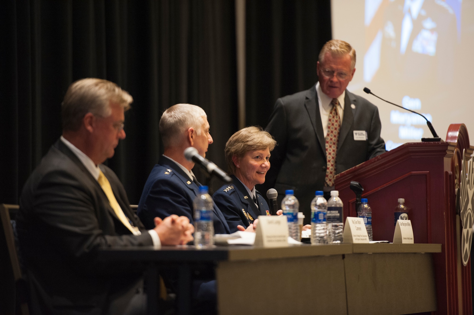 David Lange Jr., Federal Express managing director, Maj. Gen. Mark Camerer, Air Mobility Command strategic plans, requirements and programs director, and Gen. Maryanne Miller, Air Mobility Command commander, participate in the Expanding the Competitive Airlift Edge panel during the Air Force Association's Air, Space and Cyber Conference in National Harbor, Md., Sept. 17, 2019. The ASC Conference is a professional development conference that offers the opportunity for Department of Defense personnel to participate in forums, speeches and workshops. (U.S. Air Force photo by Tech. Sgt. Robert Barnett)