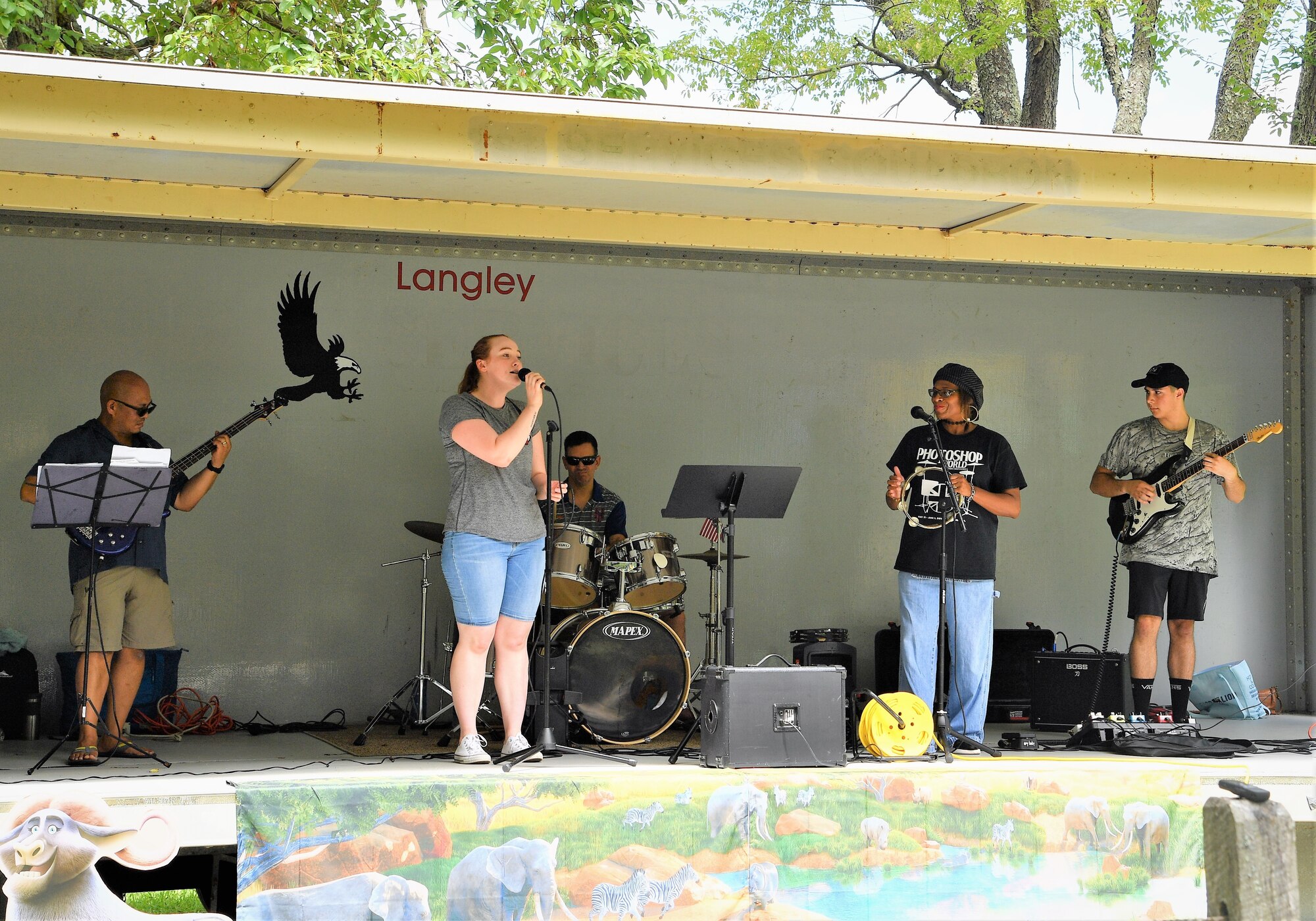 Members of the 363d ISR Wing’s band, Collateral Damage, perform at the command’s annual summer picnic at Bethal Park, Virginia, July 23, 2019. The band has been around since before the wing’s activation. (U.S. Air Force photo by Robert Mehal)