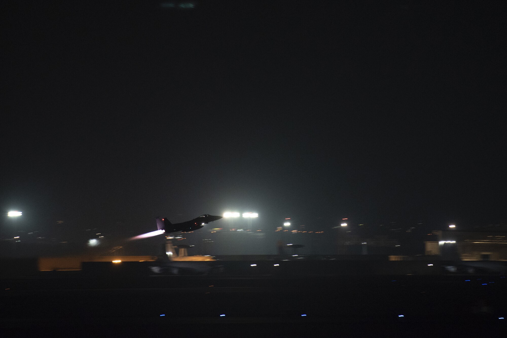 A 67th Fighter Squadron F-15C Eagle takes off for a mission at Kadena Air Base, Japan, Sept. 16, 2019.
