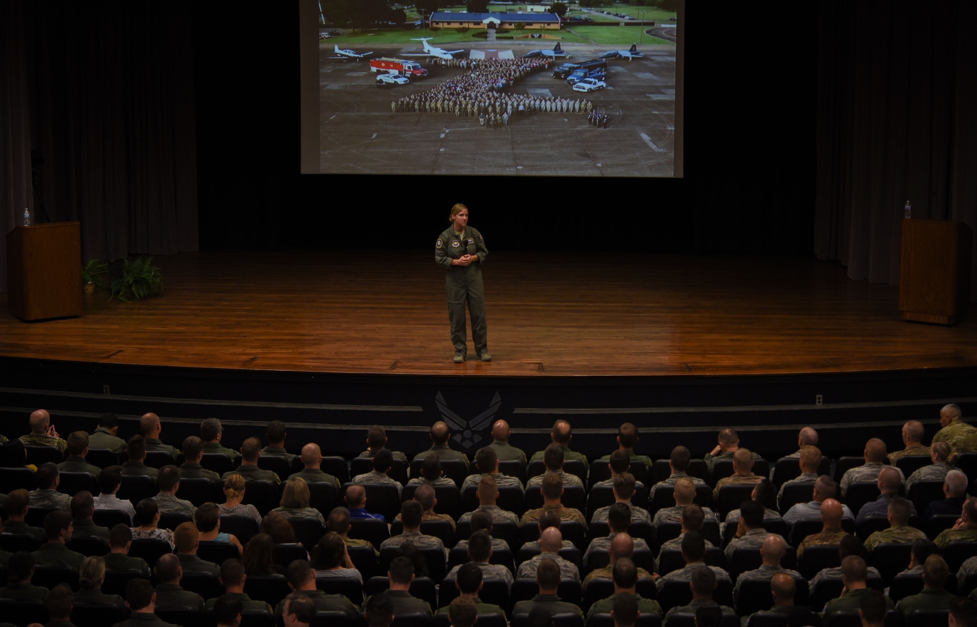 Col. Samantha Weeks, 14th Flying Training Wing commander, speaks during her commander’s call Aug. 22, 2019, at Columbus Air Force Base, Miss. Weeks held the commander’s call to communicate the importance of resiliency and mental health. (U.S. Air Force photo by Airman Davis Donaldson)