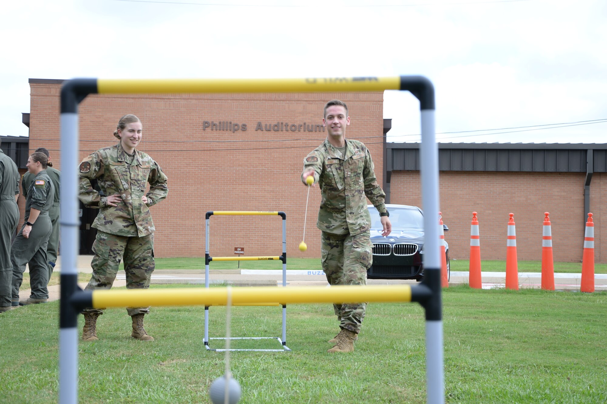 2nd Lts. Stefanie Polivka and Andrew Huxhold play ladder golf Aug. 22, 2019 on Columbus Air Force Base, Mississippi. Units on base utilized the Tactical Pause, directed by Chief of Staff of the Air Force Gen. David L. Goldfein, to relax and connect with each other. (U.S. Air Force photo by Senior Airman Beaux Hebert)