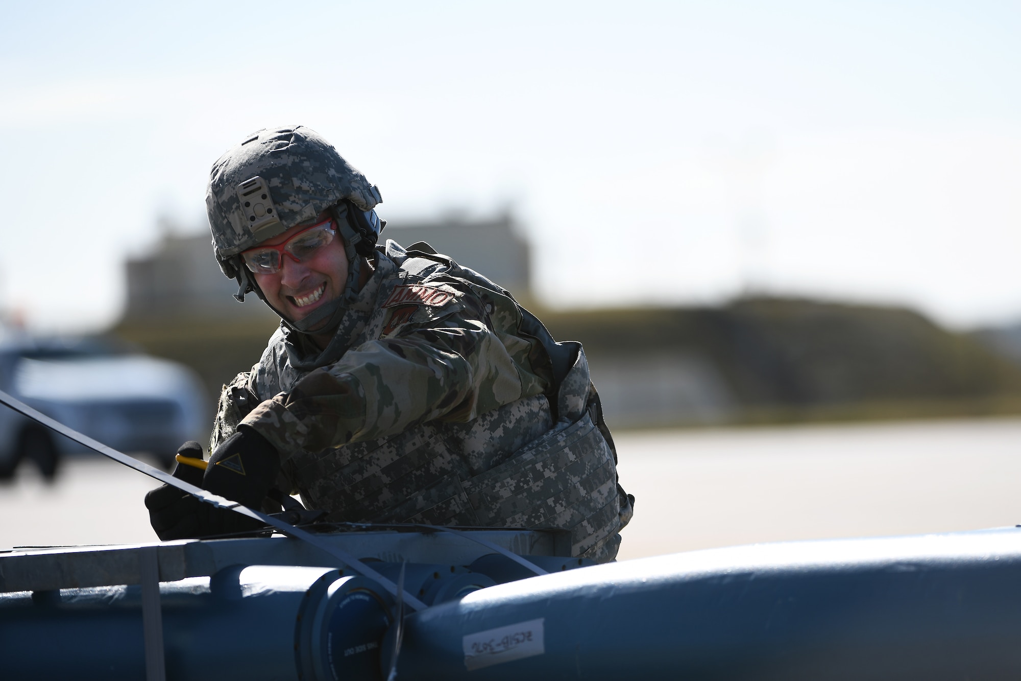 An Airman assigned to the 48th Munitions Squadron assembles munitions during a Forward Arming and Refueling Point exercise Royal Air Force Mildenhall, England, Sept. 12, 2019. Liberty Wing Airmen the opportunity to execute unloading the MC-130J aircraft at the FARP point and bomb-building on-site to re-arm participating F-15E Strike Eagles.  (U.S. Air Force photo by Airman 1st Class Shanice Williams-Jones)