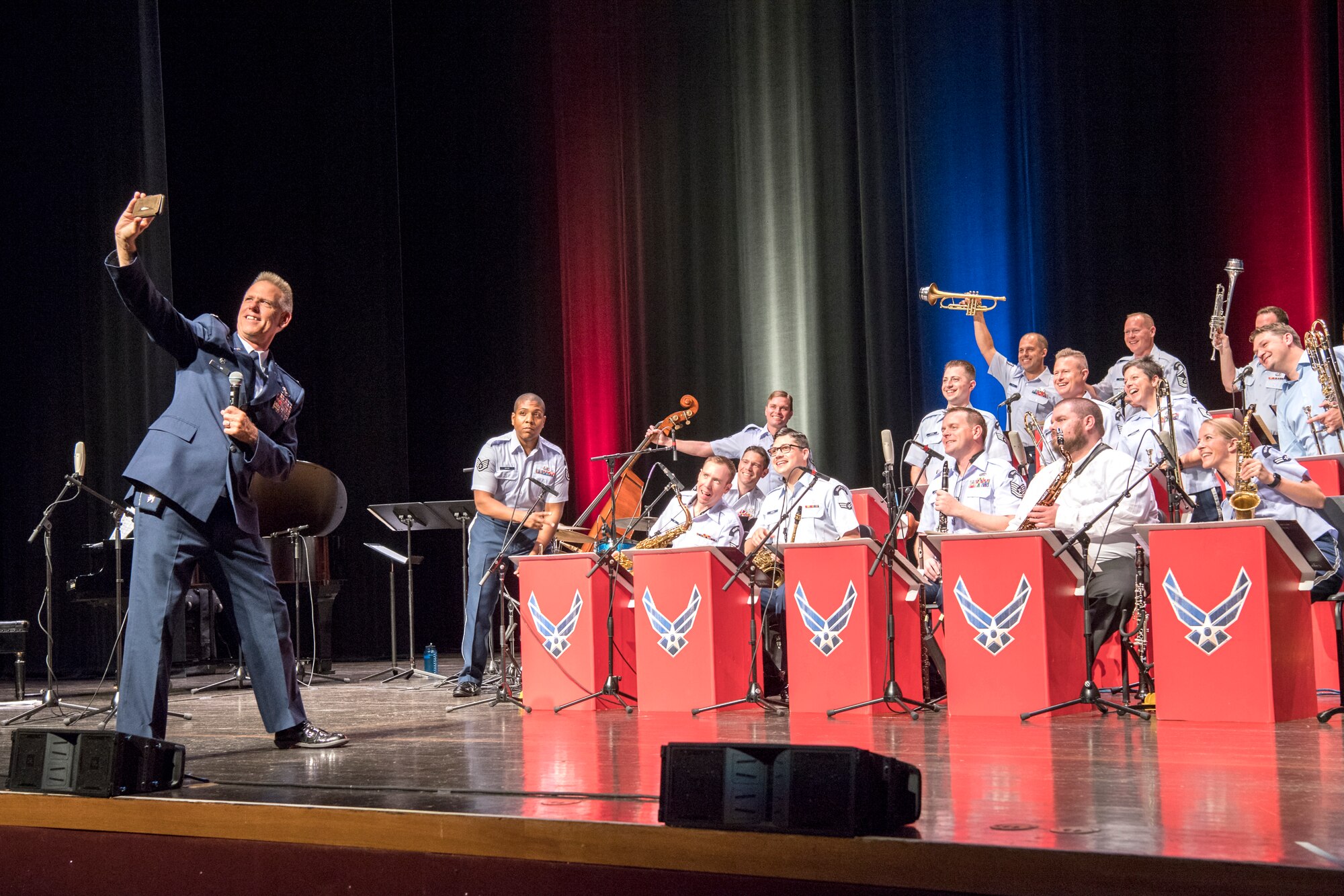 Col. Larry Shaw, 434th Air Refueling Wing commander, takes a selfie with the U.S. Air Force Band of Mid-America Shades of Blue Jazz Ensemble Sept. 10, 2019 at the Honeywell Center in Wabash, Indiana. During the concert Shaw thanked attendees for their support of the military and the Hoosier Wing. (U.S. Air Force photo/Master Sgt. Ben Mota)