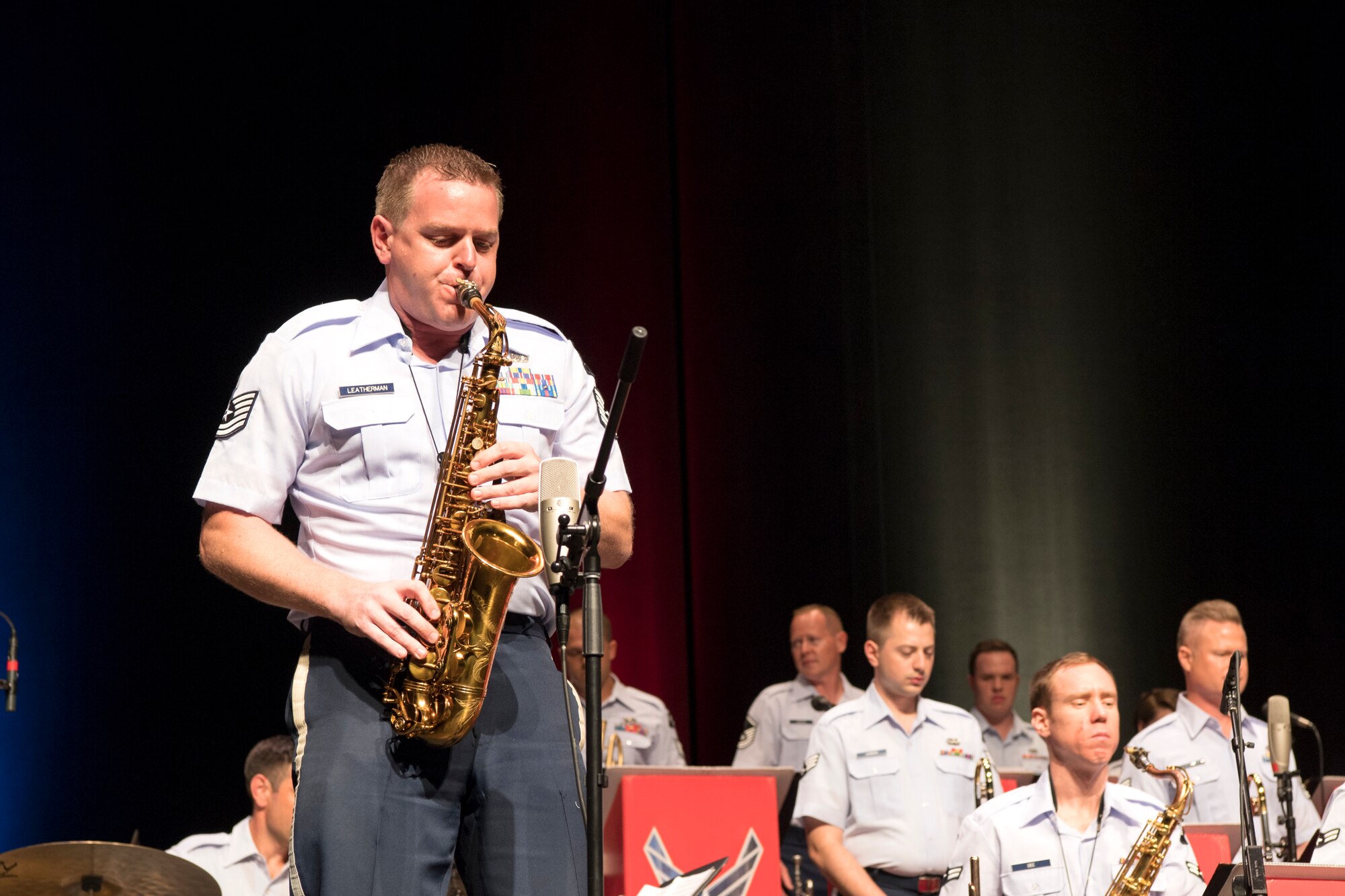 Tech. Sgt. Ryan Leatherman, U.S. Air Force Band of Mid-America Shades of Blue Jazz Ensemble saxophonist, performs a solo during a concert at the Honeywell Center in Wabash, Indiana Sept. 10, 2019. Prior to joining the Air Force his career took him throughout the United States and Europe, where he performed with renowned artists in a variety of musical styles, including Dick Oatts, Bobby Shew, Sinfonia da Camera, and The Temptations. (U.S. Air Force photo/Master Sgt. Ben Mota)