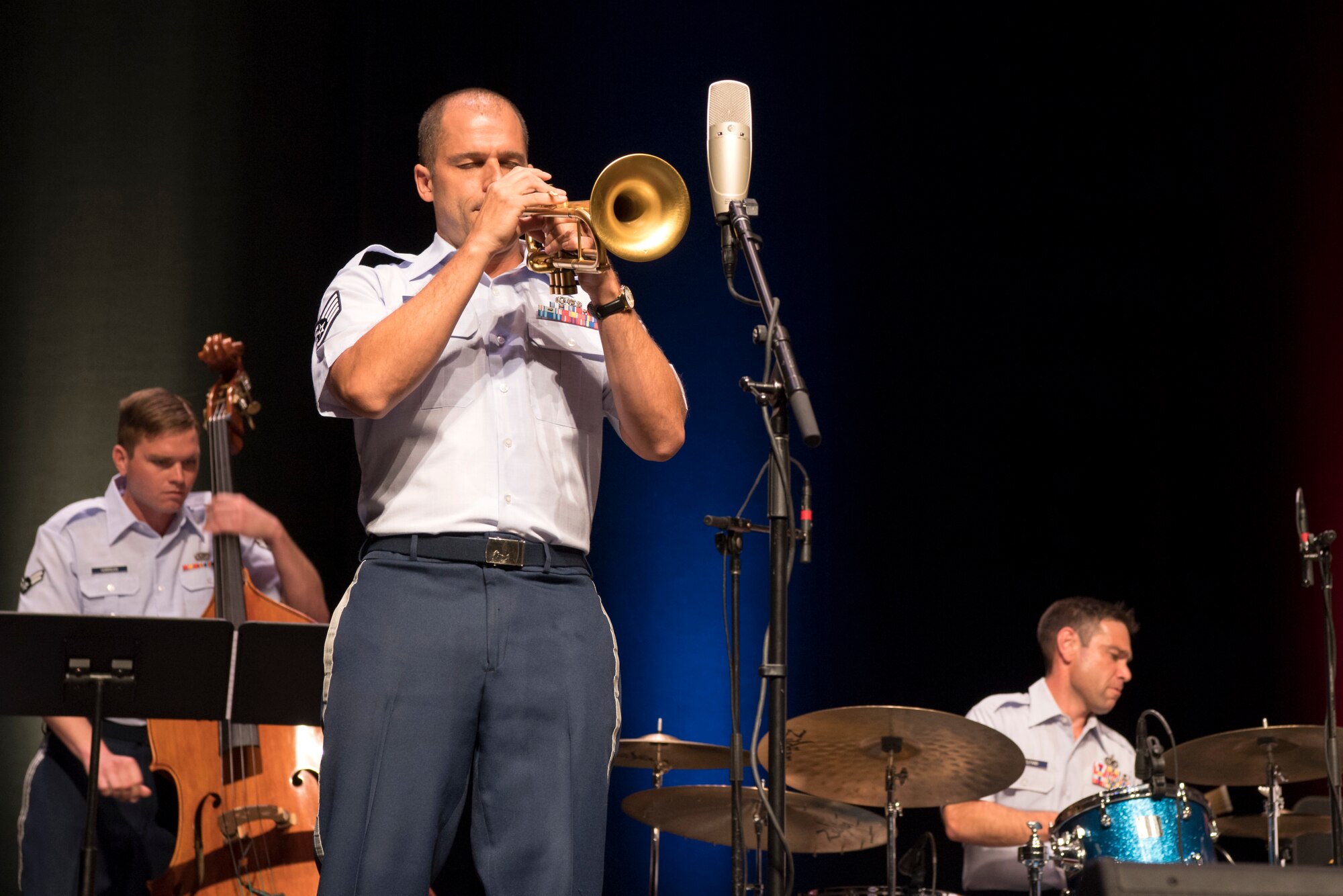 Staff Sgt. Benjamin Paille, U.S. Air Force Band of Mid-America Shades of Blue Jazz Ensemble trumpet player, performs a solo during a concert at the Honeywell Center in Wabash, Indiana Sept. 10, 2019. Paille was a featured soloist in the Broadway show BLAST!, and has performed with Christian Mcbride, Robert Glasper, Cyrus Chestnut, Kevin Mohogany, Warren Wolf, Jason Moran, Eric Reed, and many others. (U.S. Air Force photo/Master Sgt. Ben Mota)
