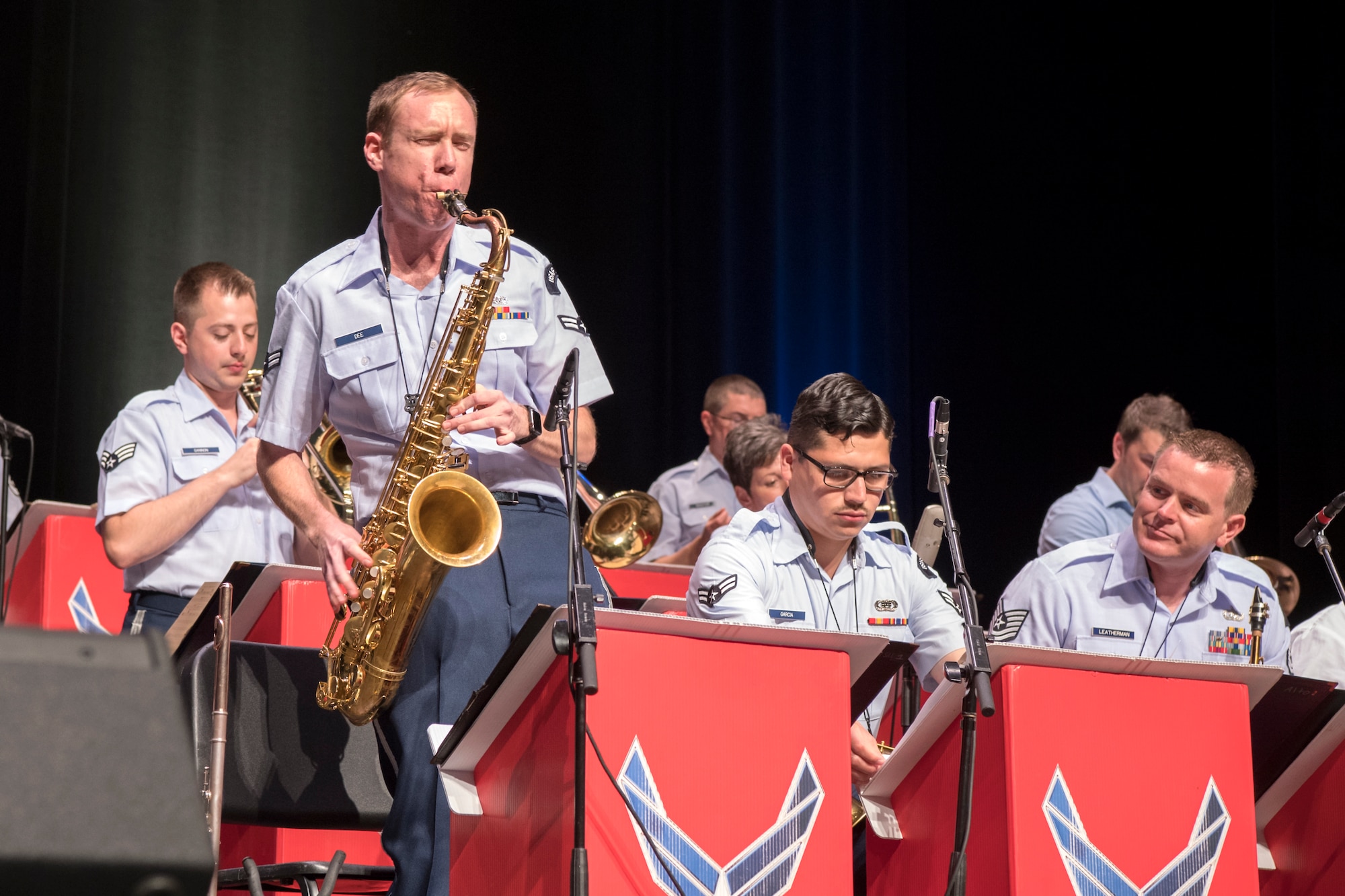 Airman 1st Class Michael Dee, U.S. Air Force Band of Mid-America Shades of Blue Jazz Ensemble saxophonist, performs a solo during a concert at the Honeywell Center in Wabash, Indiana Sept. 10, 2019. Prior to joining the Air Force, Airman Dee toured extensively across the United States and abroad with the funk and soul band Josh Hoyer and Soul Colossal. (U.S. Air Force photo/Master Sgt. Ben Mota)
