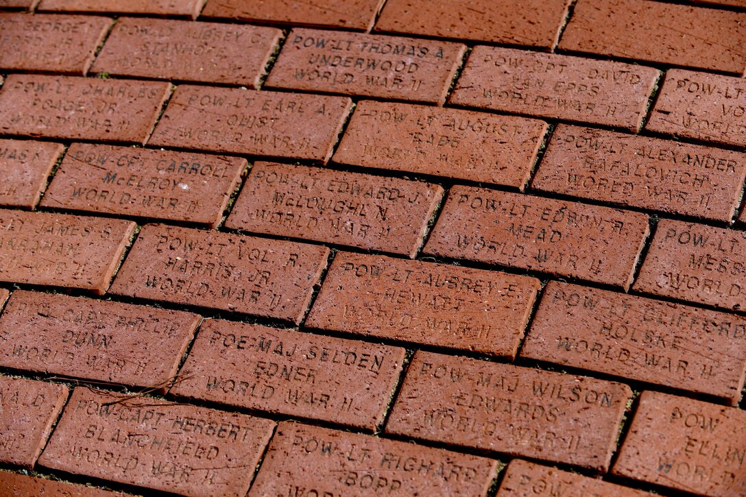 Bricks surrounding Seymour Johnson Air Force Base, North Carolina surround Heritage Park. Etched into each brick is the name of each service member that has been given the status of Prisoner of War or Missing in Action while serving in the 4 FW or its legacy units. (U.S. Air Force photo by Staff Sgt Michael Charles)