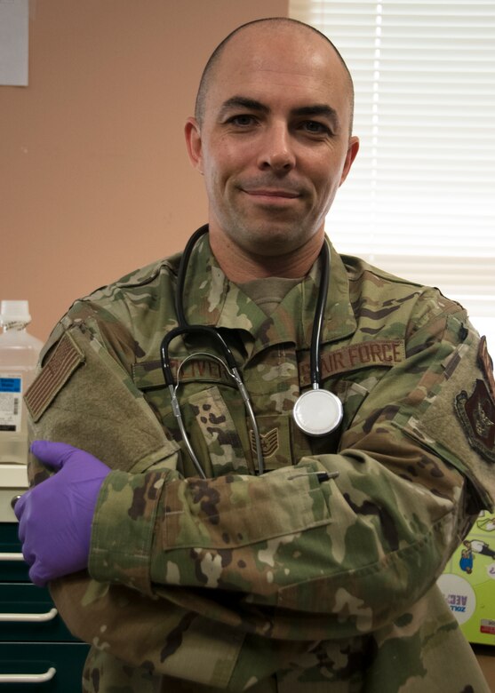 Tech Sgt. Simon Oliver, 459th Aeromedical Staging Squadron medical technician, poses for a photo Sept. 19, 2019, at Joint Base Andrews, Md. Oliver recently played a part in saving a passengers life while on a commercial flight to Jamaica. He credits his skills to his Air Force training. (U.S. Air Force photo by Staff Sgt. Cierra Presentado/Released)