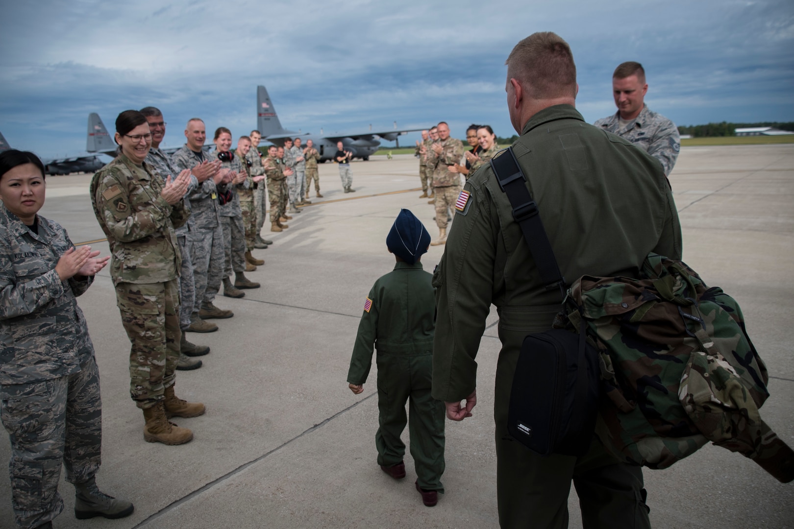 Ayden Houston, 6, walks with aircrew to the flight line after being named honorary "Pilot for a Day" Sept. 15, 2019, at the 179th Airlift Wing, Mansfield, Ohio. The 164th Airlift Squadron collaborated with A Special Wish Foundation of Cleveland to provide Ayden with the unique experience. He has been battling a variety of health issues since birth.