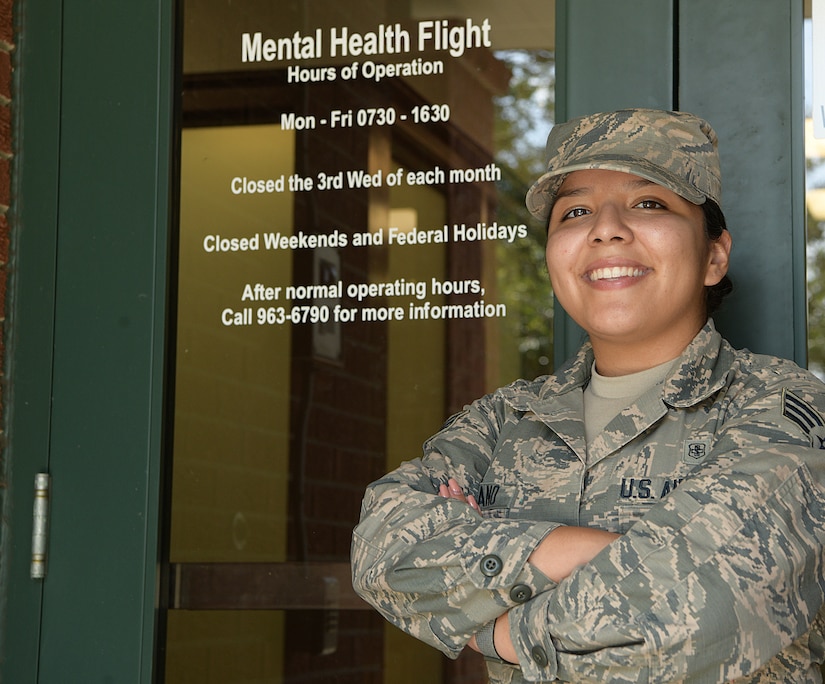 U.S. Air Force Senior Airman Mayra Serrano, a mental health technician assigned to the 628th Medical Group, stands in front of the Mental Health Clinic entrance Sept. 16, 2019, at Joint Base Charleston, S.C. Air Force medical technicians like Serrano help ensure the medical readiness, both physically and mentally, of over 200,000 Airmen around the world.