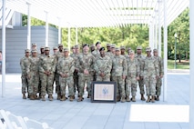 Soldiers assigned to the Houston Medical Recruiting Company pose for a group photo with Capt. Sanders, outgoing commander, Houston MRC, prior to the unit's biennial change of command ceremony at Hermann Park Conservancy, Houston, Texas, Sept. 5.