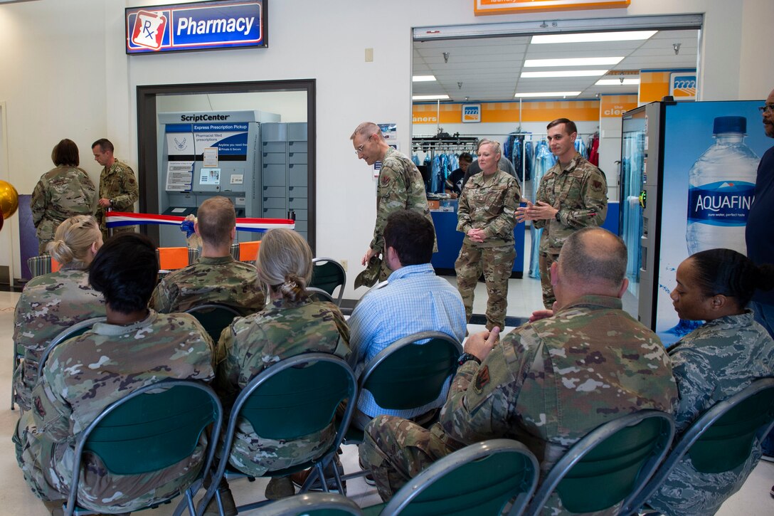 Airmen from the 23d Wing attend the ScriptCenter ribbon cutting ceremony Sept. 19, 2019, at Moody Air Force Base, Ga. The ScriptCenter is a machine that stores and dispenses various medications to customers and is intended to streamline the main pharmacy refill and dispensing services for Airmen, their families and retirees. (U.S. Air Force photo by Airman Azaria E. Foster)