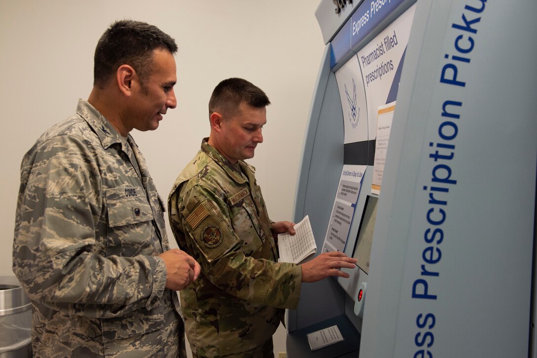 Col. Benjamin Conde, 23d Wing vice commander, registers himself to retrieve medication from the ScriptCenter Sept. 19, 2019, at Moody Air Force Base, Ga. The ScriptCenter is a machine that stores and dispenses various medications to customers and is intended to streamline the main pharmacy refill and dispensing services for Airmen, their families and retirees. (U.S. Air Force photo by Airman Azaria E. Foster)