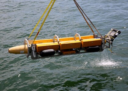 A view of an unmanned underwater vehicle (UUV) Knightfish being recovered by Military Sealift Command's expeditionary sea base