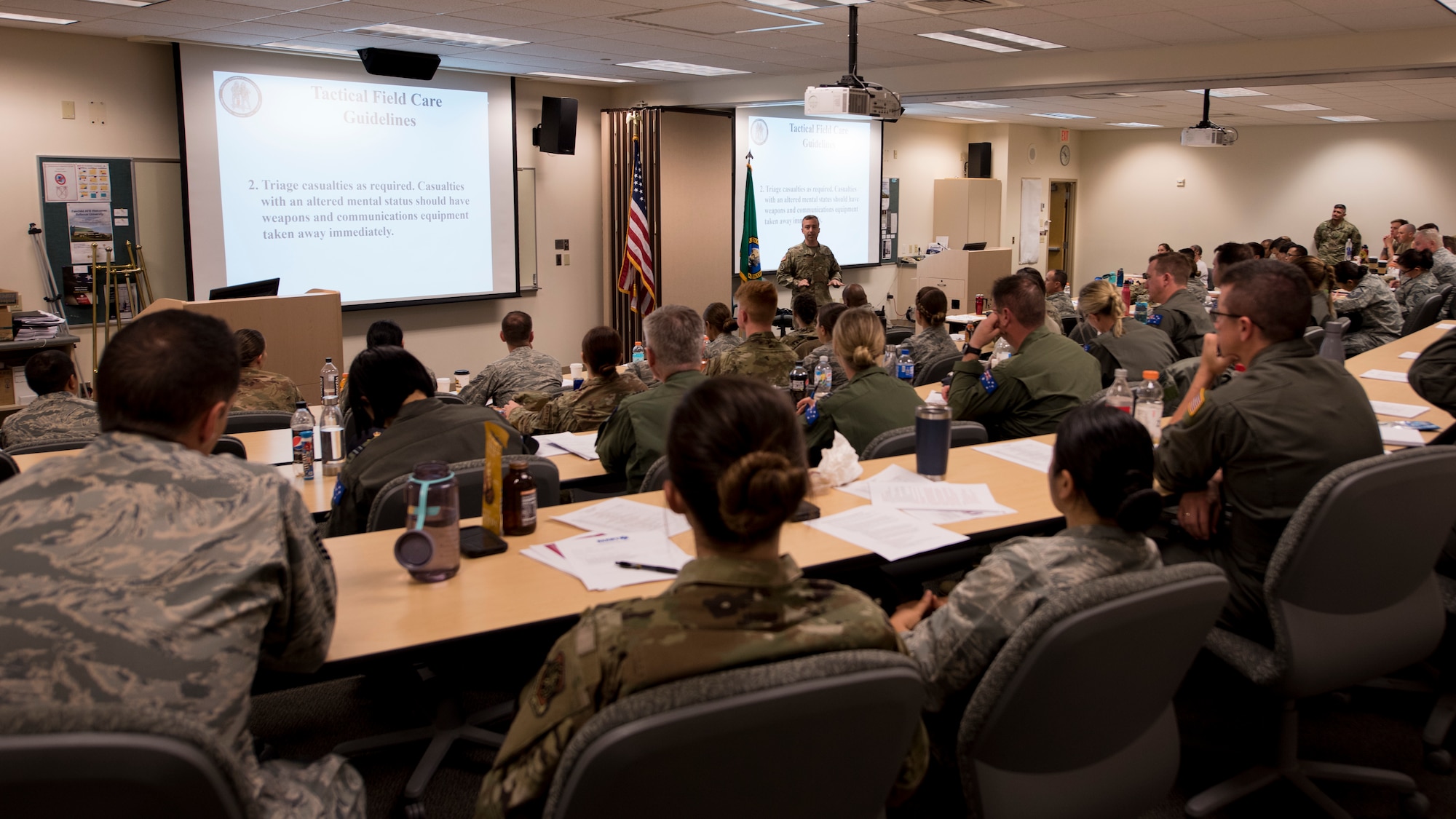 Students of the Tactical Combat Casualty Care course attend their first day of instruction by reviewing Department of Defense guidelines and current practices at Fairchild Air Force Base, Washington, Sept. 12, 2019. The TCCC is the replacement for the former Self-Aid Buddy Care training and will become the new standard across all U.S. military service branches. (U.S. Air Force photo by Senior Airman Ryan Lackey)