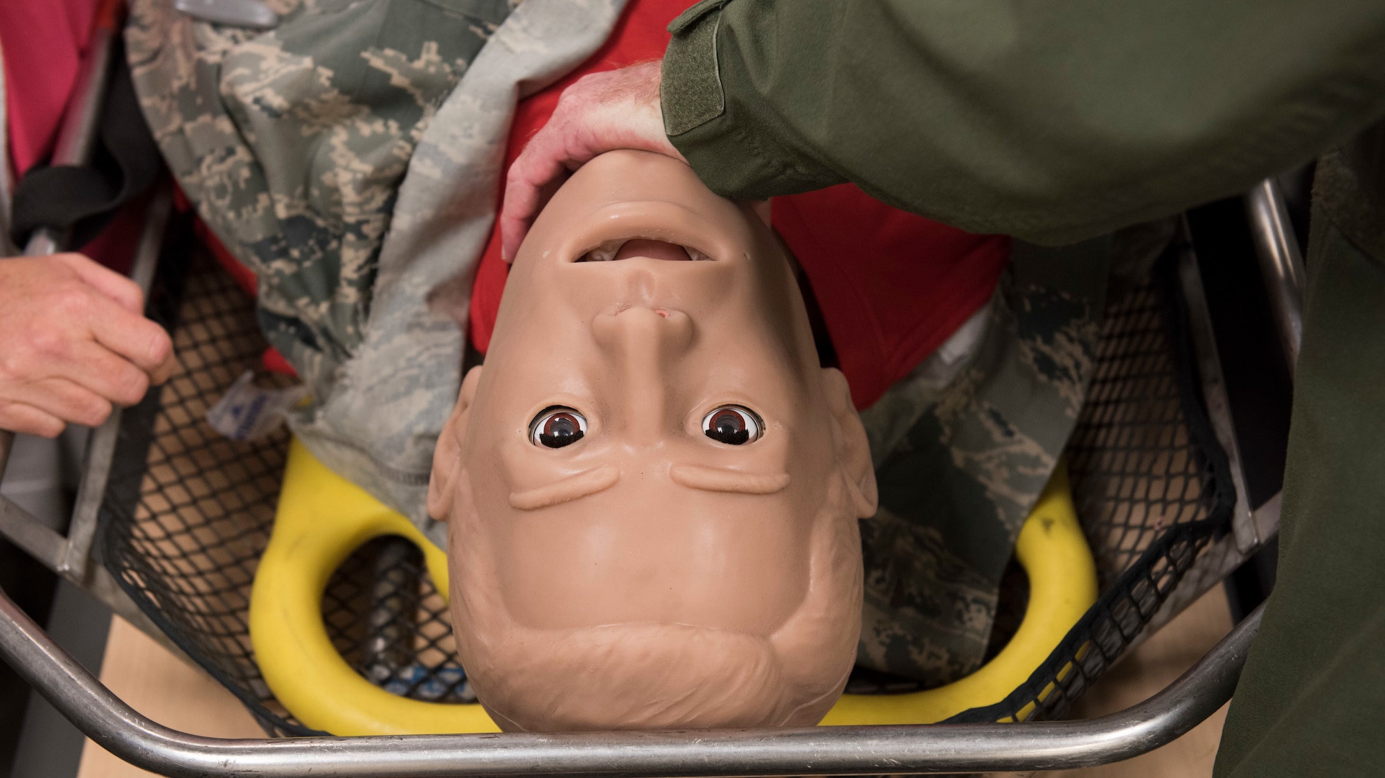 Students practice endotracheal intubation procedures on a training mannequin during the Tactical Combat Casualty Care course at Fairchild Air Force Base, Washington, Sept. 12, 2019. In a continued effort to save lives, the U.S. Air Force Surgeon General has mandated that all personnel quickly become TCCC certified. (U.S. Air Force photo by Senior Airman Ryan Lackey)