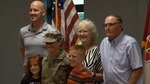 U.S. Army Reserve Lt. Col. Lisa Jaster, executive officer, 420th Engineer Brigade, poses with her family after promotion from Major to Lieutenant Colonel. Jaster graduated from Ranger School in 2015, the first female officer in the Reserve to do so. She continues to serve in the military, work as the director of engineering for a M&S engineering, and conduct speaking engagements across the country. (Courtesy Photo/ Lt. Col. Lisa Jaster)