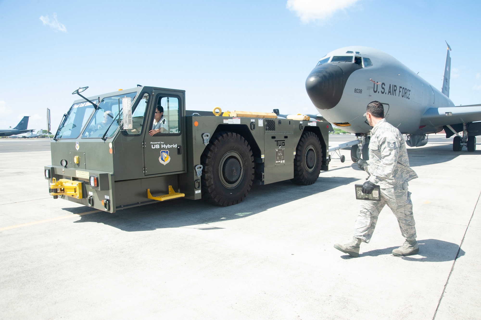 A 154th Maintenance Squadron crew chief does a final walk-around inspection before a U-30 Aircraft Tow Tractor powered by hydrogen fuel cell technology tows the aircraft, July 18, 2019, Joint Base Pearl Harbor-Hickam, Hawaii.