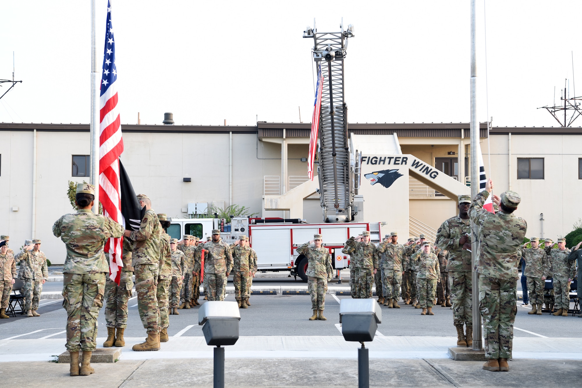 Members of the 8th Fighter Wing Honor Guard raise the American flag with the prisoners of war and missing in action flag as well as the Republic of Korea flag during the POW/MIA opening ceremony at Kunsan Air Base, Republic of Korea, Sept. 16, 2019. The 8th Fighter Wing hosted events during the week of Sept. 16 to 20, finishing with a retreat ceremony on National POW/MIA Day, Sept. 20. (U.S. Air Force photo by Staff Sgt. Joshua Edwards)