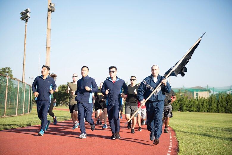 U.S. Air Force Col. Lawrence Sullivan (far right), 8th Fighter Wing vice commander, runs with Republic of Korea Air Force’s 38th Fighter Group leadership to start a 24-hour prisoners of war and missing in action memorial run at Kunsan Air Base, Republic of Korea, Sept. 19, 2019. The Wolf Pack dedicated the week in honor of POW/MIA that consisted of several events for the base to participate in. (U.S. Air Force photo by Senior Airman Stefan Alvarez)