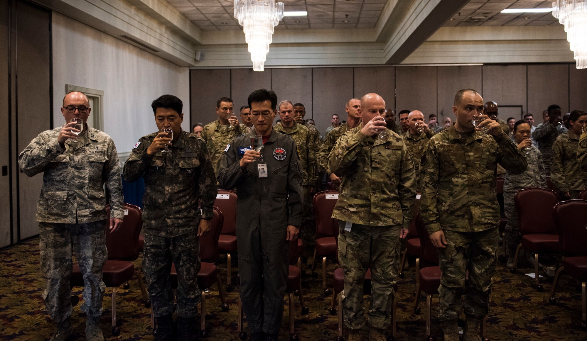 Leaders from the 8th Fighter Wing and Republic of Korea Air Force’s 38th Fighter Group toast during a prisoners of war and missing in action memorial ceremony at Kunsan Air Base, Republic of Korea, Sept. 20, 2019. There are currently more than 81,000 POW/MIAs, and over 70 percent of them are in the Indo-Pacific region. (U.S. Air Force photo by Senior Airman Stefan Alvarez)