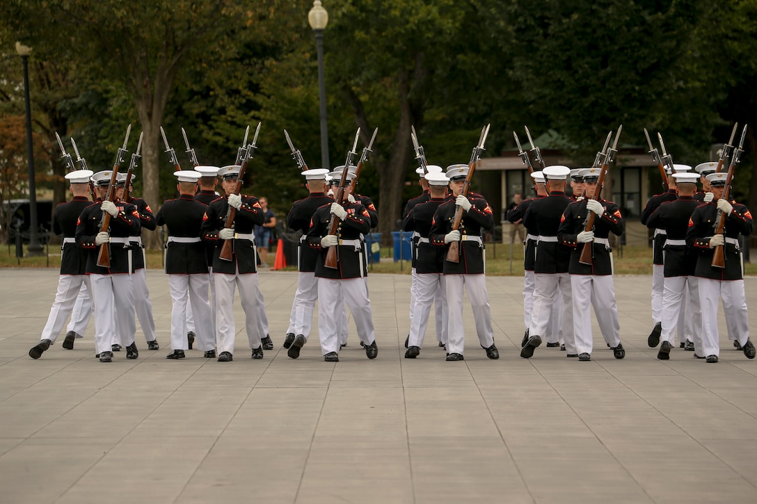 Marines with the U.S. Marine Corps Silent Drill Platoon perform for an honor flight at the Lincoln Memorial, Washington, D.C., Sept. 17, 2019. Honor Flights provide no cost transportation for U.S. military veterans to visit Washington D.C. and see the memorials of the respective wars they served in. (U.S. Marine Corps photo by Lance Cpl. Allen Sanders)