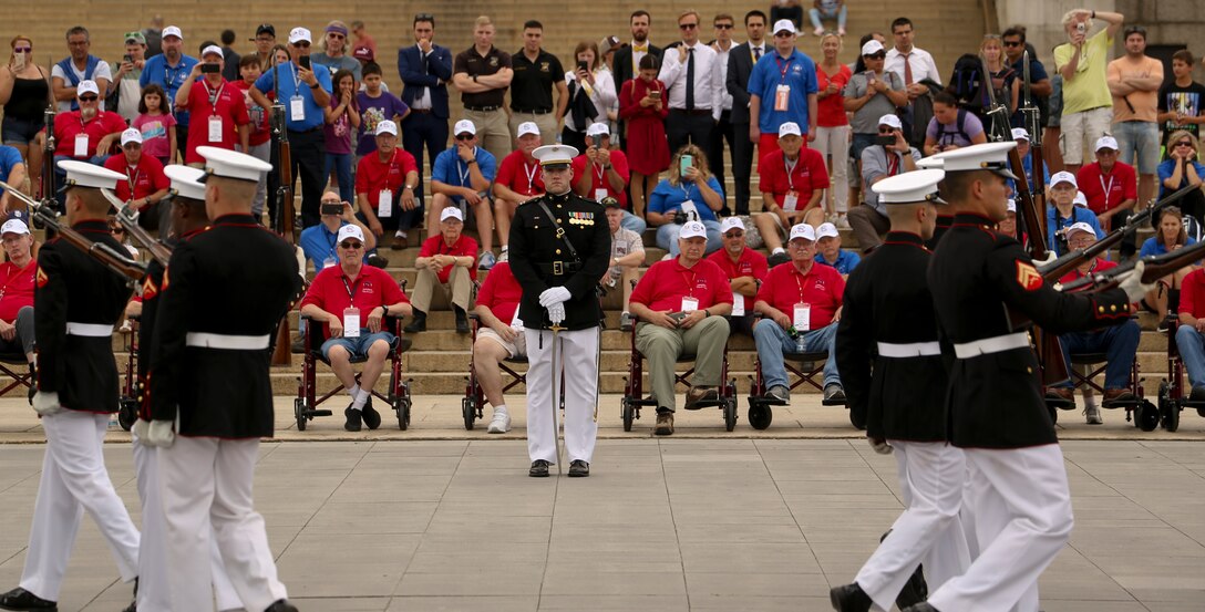 Captain Alexander Newham, platoon commander, U.S. Marine Corps Silent Drill Platoon, stands at ceremonial at-ease during an honor flight at the Lincoln Memorial, Washington, D.C., Sept. 17, 2019. Honor Flights provide no cost transportation for U.S. military veterans to visit Washington D.C. and see the memorials of the respective wars they served in. (U.S. Marine Corps photo by Lance Cpl. Allen Sanders)