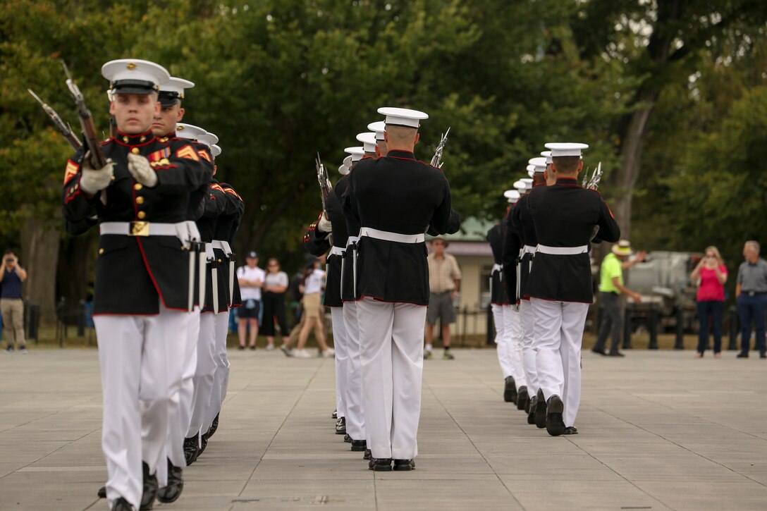 Marines with the U.S. Marine Corps Silent Drill Platoon perform their “meat grinder” sequence during an honor flight at the Lincoln Memorial, Washington, D.C., Sept. 17, 2019. Honor Flights provide no cost transportation for U.S. military veterans to visit Washington D.C. and see the memorials of the respective wars they served in. (U.S. Marine Corps photo by Lance Cpl. Allen Sanders)
