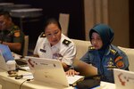 Maj. Lauren Sodentani-Yoshida, Hawaii National Guard medical officer, and her counterpart, Cdr. Zelvya Purnama Rika, assess medical requirements for the exercise stability and peacekeeping operation GEMA BHAKTI 2019 (GB19) in Jakarta, Indonesia, Sept. 18, 2019. Hawaii National Guard (HING) State Partnership Program (SPP) executed the seventh annual GB19 Staff Exercise (STAFFEX). Joint Exercise GB19 is a chairman, joint chiefs of staff STAFFEX between U.S. Indo-Pacific Command (and U.S. military service components), and the Tentara Nasional Indonesia.