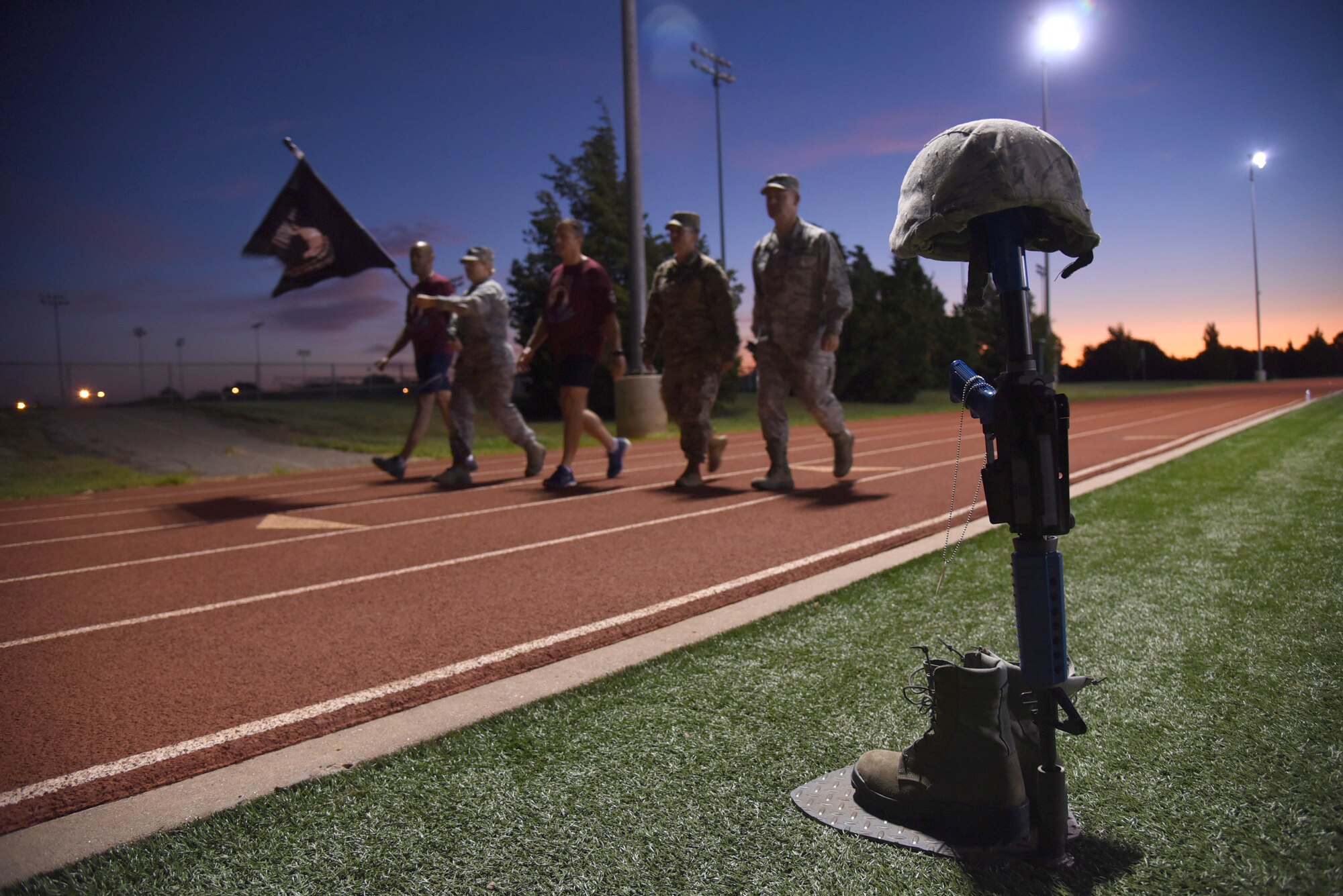 An image of Tinker senior leaders participating in the POW-MIA vigil.