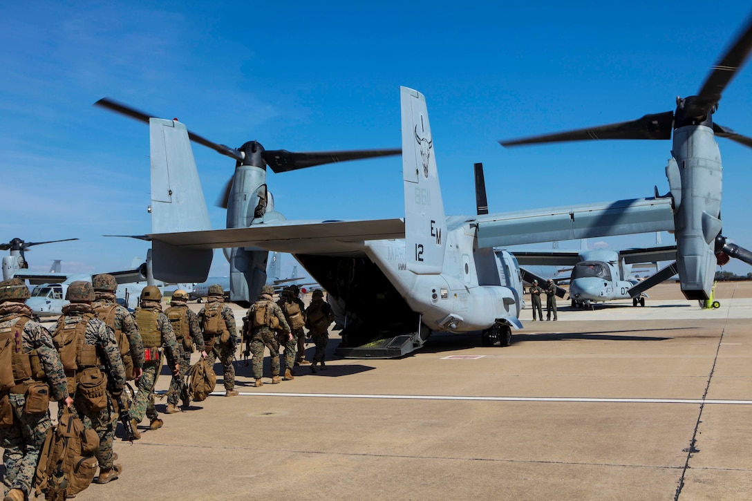 U.S. Marines with Special Purpose Marine Air-Ground Task Force-Crisis Response-Africa 19.2, Marine Forces Europe and Africa, board a U.S. Marine Corps MV-22B Osprey at Moron Air Base, Spain, during a tactical recovery of aircraft and personnel exercise, Sept. 10, 2019. TRAP is a core function of a crisis-response force and SPMAGTF-CR-AF 19.2 consistently trains to increase TRAP proficiency by rehearsing realistic scenarios. SPMAGTF-CR-AF is deployed to conduct crisis-response and theater-security operations in Africa and promote regional stability by conducting military-to-military training exercises throughout Europe and Africa. (U.S. Marine Corps photo by Capt. Clay Groover)