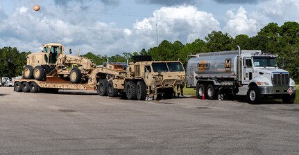 Soldiers from the 92nd Engineer Battalion, based at Fort Stewart, Georgia, refuel their vehicles after arriving in Camp Blanding, Florida, for Hurricane Dorian support Sept. 3.