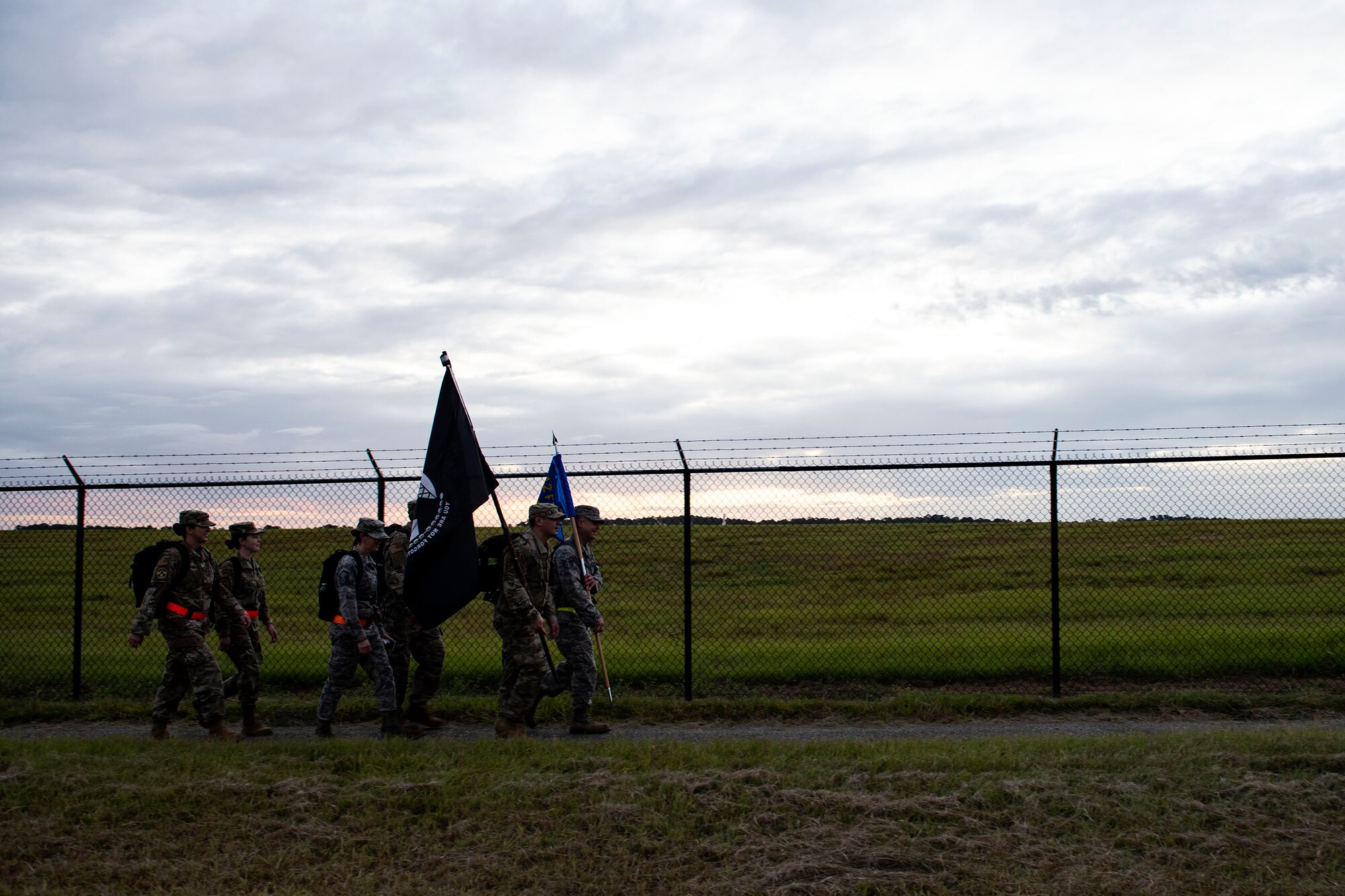 Airmen from the 476th Fighter Group participate in the POW/MIA Recognition Day ruck march Sept. 20, 2019, at Moody Air Force Base, Ga. The 347th Operations Support Squadron hosted the 24-hour ruck march to pay tribute to those who’ve been captured or missing in the line of duty. (U.S. Air Force photo by Senior Airman Erick Requadt)