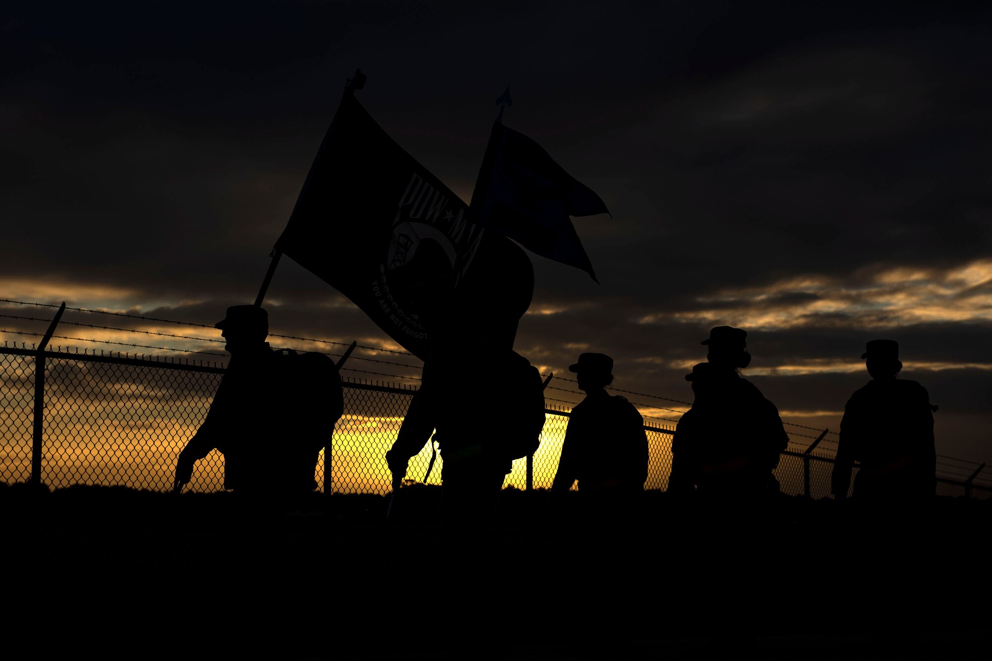 Airmen from the 476th Fighter Group participate in the POW/MIA Recognition Day ruck march Sept. 20, 2019, at Moody Air Force Base, Ga. In 1979, the United States Congress passed a resolution authorizing National POW/MIA Recognition Day to be observed together with the national effort of bringing isolated personnel home. The 347th Operations Support Squadron hosted the 24-hour ruck march to pay tribute to those who’ve been captured or missing in the line of duty. (U.S. Air Force photo by Senior Airman Erick Requadt)