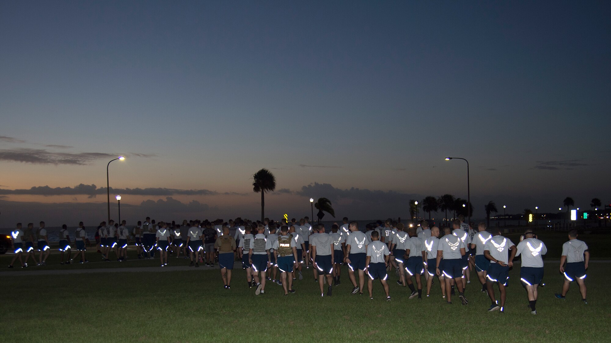 U.S. Air Force Airmen walk towards the starting line during the MacDill Air Force Sergeants Association’s POW/ MIA Recognition Day 5K, Sept. 20, 2019, at MacDill Air Force Base, Fla. POW/MIA Recognition Day is commemorated nationally on the third Friday of every September in honor of service members who were prisoners of war as well as those missing in action. (U.S. Air Force photo by Airman 1st Class Shannon Bowman)