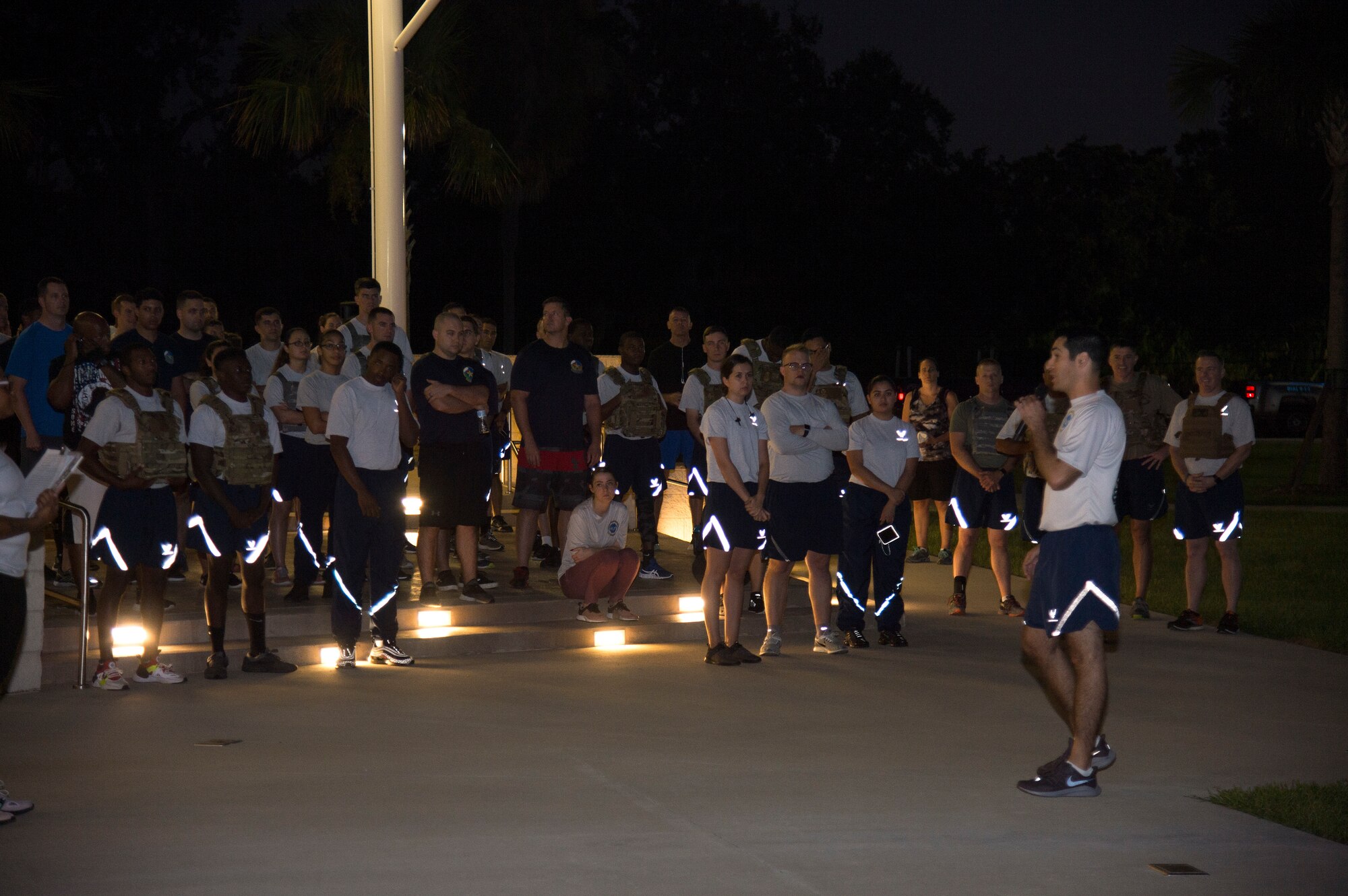 U.S. Air Force Col. Benjamin Robins, the 6th Air Mobility Wing vice commander, gives opening remarks prior to a POW/ MIA Recognition Day 5K, Sept. 20, 2019, at MacDill Air Force Base, Fla.  POW/MIA Recognition Day is commemorated nationally on the third Friday of every September in honor of service members who were prisoners of war as well as those missing in action. (U.S. Air Force photo by Airman 1st Class Shannon Bowman)