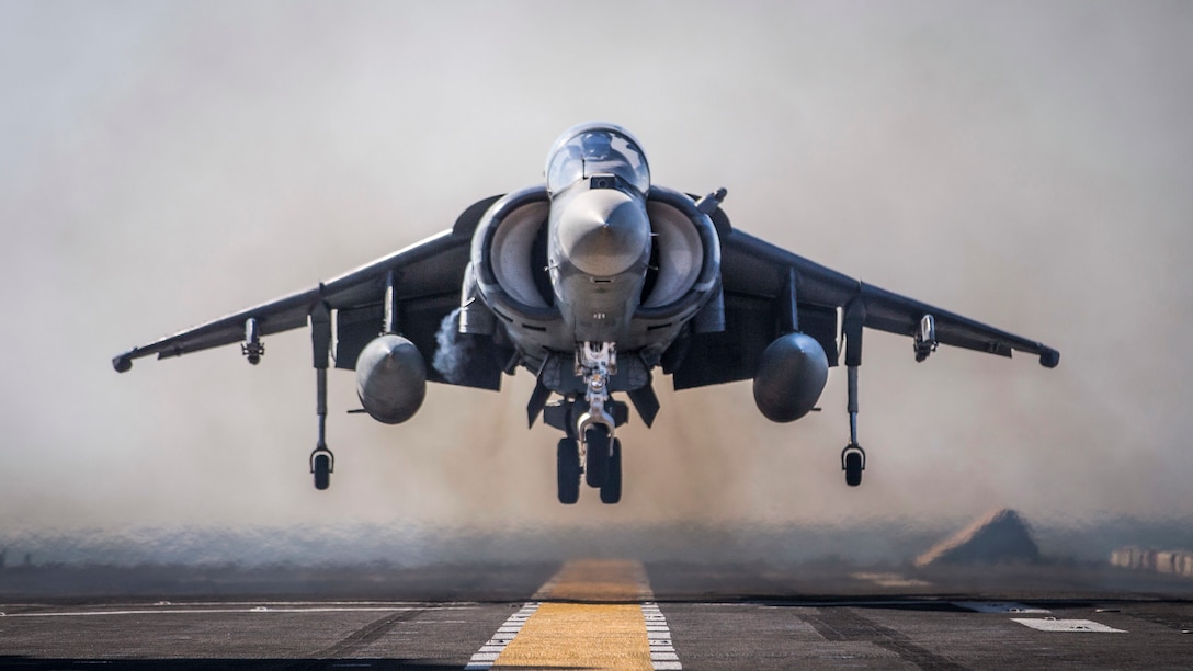 An AV-8B Harrier attached to Marine Medium Tiltrotor Squadron 163 (Reinforced), 11th Marine Expeditionary Unit (MEU), lands aboard the amphibious assault ship USS Boxer (LHD 4). The Boxer Amphibious Ready Group and 11th MEU are deployed to the U.S. 5th Fleet area of operations in support of naval operations to ensure maritime stability and security in the Central Region, connecting the Mediterranean and the Pacific through the Western Indian Ocean and three strategic choke points. (U.S. Marine Corps photo by Lance Cpl. Dalton S. Swanbeck/Released)