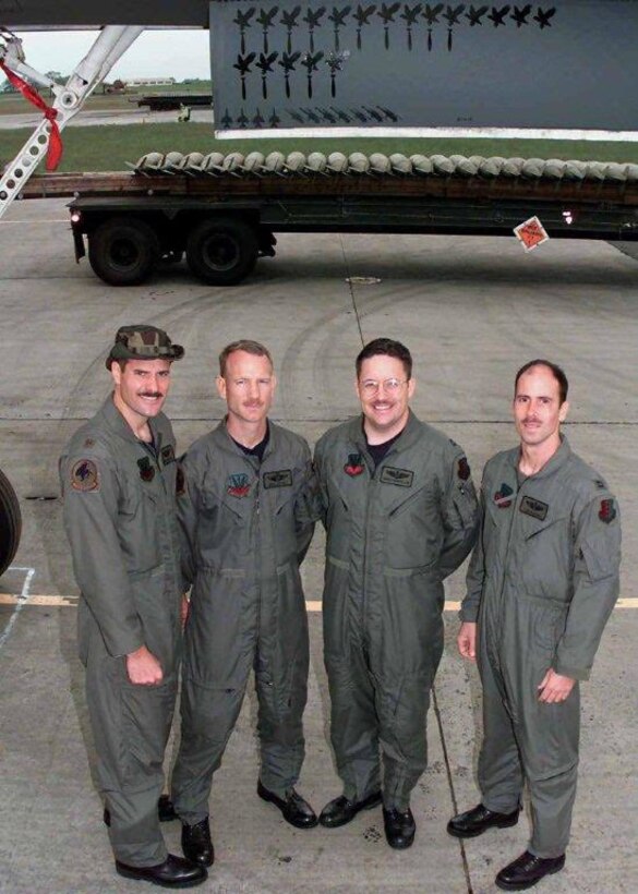 Ben Leitzel (second from left), father of Captain Erik Leitzel, a pilot assigned to the 393rd Bomb Squadron at Whiteman Air Force Base, Missouri, poses for a photo with his crew before a mission in 1999. The retired colonel flew 16 B-1 combat sorties During Operation Allied Force out of Royal Air Force Fairford, where his own son would later serve. Erik Leitzel continued his family's aviator legacy when he became a third-generation bomber pilot, flying the B-2 Spirit, the U.S. Air Force's premier stealth bomber. (Courtesy photo)