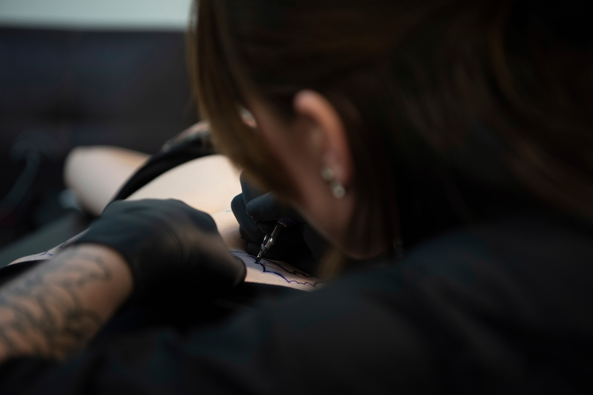 Part-time tattoo artist, full-time Airman