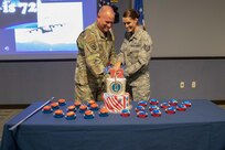 Joint Task Force Civil Support Command Senior Enlisted Leader Chief Master Sgt. James Brown and Tech. Sgt. Jordan Daniels cut a cake during the 72nd Air Force birthday celebration at the command’s headquarters. The theme for this year’s celebration is “Frontiers of Blue…this is 72!” which focuses on heritage, warfighting capability and innovation. (Official DoD photo by Mass Communication Specialist 3rd Class Michael Redd/RELEASED)