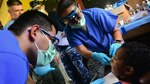 Papua New Guinea Dentist Mentors Local, US Medics