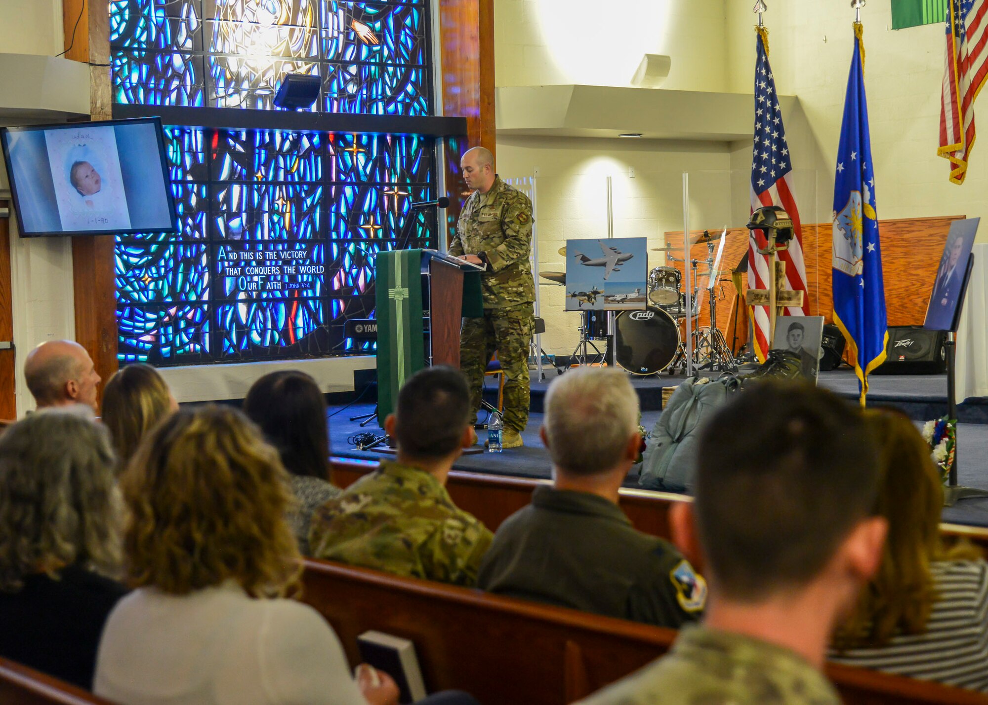 Master Sgt. Brandon Fountain, SERE/Test Parachute Program superintendent, shares his memories of Staff Sgt. Adam Erickson during a during a memorial service in honor of Staff Sgt. Erickson at Edwards Air Force Base, California, Sept. 20. (U.S. Air Force photo by Giancarlo Casem)